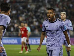 Real Madrid's Brazilian forward Rodrygo (R) celebrates with Real Madrid's Spanish midfielder Dani Ceballos (L) after scoring his team's third goal during the FIFA Club World Cup semi-final football match between Egypt's Al-Ahly and Spain's Real Madrid at the Prince Moulay Abdellah Stadium in Rabat on February 8, 2023. (Photo by Khaled DESOUKI / AFP)