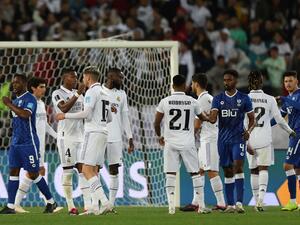 Players greet one another at the end of the FIFA Club World Cup final football match between Spain's Real Madrid and Saudi Arabia's Al-Hilal at the Prince Moulay Abdellah Stadium in Rabat on February 11, 2023. (Photo by Fadel Senna / AFP)