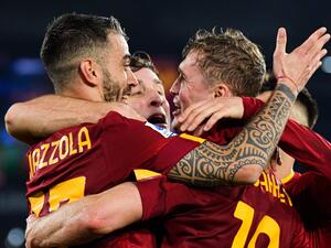 AS Roma's Norwegian forward Ola Solbakken (R) celebrates after opening the scoring during the Italian Serie A football match between AS Roma and Hellas Verona, on February 19, 2023 at the Olympic stadium in Rome. (Photo by Tiziana FABI / AFP)