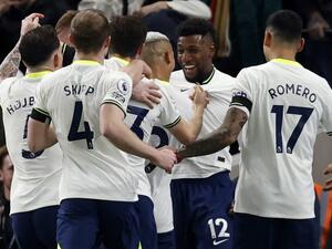 Tottenham Hotspur's Brazilian defender Emerson Royal (2R) celebrates scoring the opening goal during the English Premier League football match between Tottenham Hotspur and West Ham United at Tottenham Hotspur Stadium in London, on February 19, 2023. (Photo by Ian Kington / AFP)