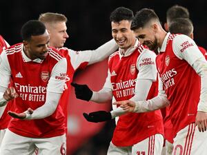 Arsenal's Brazilian midfielder Gabriel Martinelli celebrates scoring the team's second goal with Arsenal's Brazilian striker Gabriel Jesus (L) and Arsenal's Italian midfielder Jorginho during the English Premier League football match between Arsenal and Everton at the Emirates Stadium in London on March 1, 2023. (Photo by Glyn KIRK / AFP)