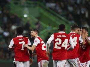 Arsenal's players celebrate after Sporting Lisbon's Japanese midfielder Hidemasa Morita scored an own goal during the UEFA Europa League last 16 first leg football match between Sporting CP and Arsenal at Jose Alvalade stadium in Lisbon on March 9, 2023. (Photo by FILIPE AMORIM / AFP)