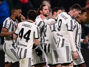 Juventus' French midfielder Adrien Rabiot (C) celebrates a goal with teammates during the Italian Serie A football match between Juventus and Torino at the Juventus Stadium in Turin on February 28, 2023. (Photo by MARCO BERTORELLO / AFP)