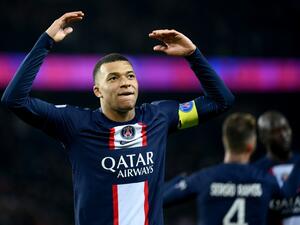  Paris Saint-Germain's French forward Kylian Mbappe celebrates after scoring a goal during the French L1 football match between Paris Saint-Germain (PSG) and FC Nantes at The Parc des Princes Stadium in Paris on March 4, 2023. (Photo by FRANCK FIFE / AFP)