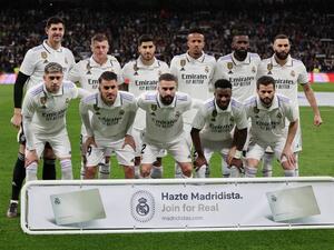 Real Madrid's players pose for a photograph prior the Spanish League football match between Real Madrid CF and Club Atletico de Madrid at the Santiago Bernabeu stadium in Madrid, on February 25, 2023. (Photo by Pierre-Philippe Marcou / AFP)