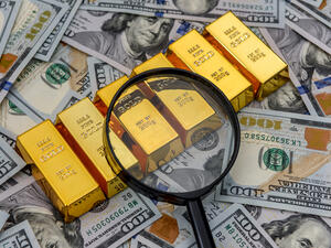Gold up, dollar lower