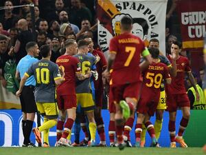 Footballers in action during the UEFA Europa Conference League final football match between AS Roma and Feyenoord at the Air Albania Stadium in Tirana on May 25, 2022. (Photo by OZAN KOSE / AFP)