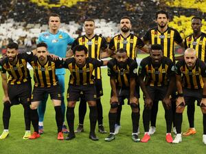 Ittihad's players take the field for the Saudi Pro League football match between al-Ittihad and al-Hilal at the King Abdullah Sports City in Jeddah on May 23, 2022. (Photo by AFP)