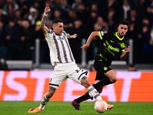 Juventus' Argentinian forward Angel Di Maria and Sporting CP's Portuguese defender Goncalo Inacio (R) go for the ball during the UEFA Europa League quarter-finals first leg football match between Juventus and Sporting CP, on April 13, 2023 at the Juventus stadium in Turin. (Photo by Marco BERTORELLO / AFP)