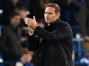 Chelsea's English caretaker manager Frank Lampard applauds the fans following the Champions League quarter-final second-leg football match between Chelsea and Real Madrid at Stamford Bridge in London on April 18, 2023. Real Madrid won the match 2-0. (Photo by Glyn KIRK / IKIMAGES / AFP)