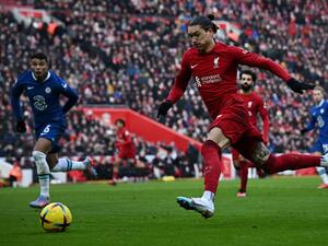 Liverpool's Uruguayan striker Darwin Nunez runs with the ball during the English Premier League football match between Liverpool and Chelsea at Anfield in Liverpool, north west England on January 21, 2023. (Photo by Paul ELLIS / AFP)