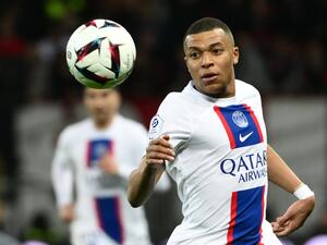 Paris Saint-Germain's French forward Kylian Mbappe looks at the ball during the French L1 football match between Nice (OGCN) and Paris Saint-Germain (PSG) at the Allianz Riviera stadium in Nice, on April 8, 2023. (Photo by CHRISTOPHE SIMON / AFP)