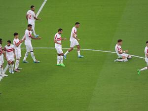 Ahly's players react to a penalty during the Lusail Super Cup football match between Saudi Arabia's Al-Hilal and Egypt's Zamalek at the Lusail Stadium on the outskirts of Qatar's capital Doha on September 9, 2022. (Photo by MUSTAFA ABUMUNES / AFP)