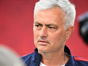 AS Roma's Portuguese coach Jose Mourinho speaks during a pitch inspection on the eve of the UEFA Europa League final football match between Sevilla FC and AS Roma at the Puskas Arena in Budapest, Hungary, on May 30, 2023. (Photo by Attila KISBENEDEK / AFP)