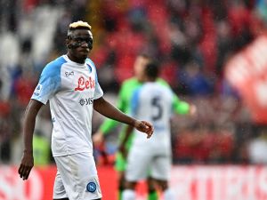 Napoli's Nigerian forward Victor Osimhen reacts at the end of the Italian Serie A football match between Monza and Napoli on May 14, 2023 at the Brianteo stadium in Monza. (Photo by GABRIEL BOUYS / AFP)
