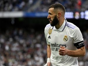 Real Madrid's French forward Karim Benzema celebrates scoring his team's first goal during the Spanish league football match between Real Madrid CF and Rayo Vallecano de Madrid at the Santiago Bernabeu stadium in Madrid on May 24, 2023. (Photo by JAVIER SORIANO / AFP)