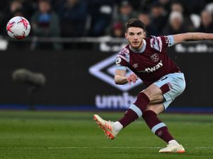 West Ham United's English midfielder Declan Rice shoots the ball during the English Premier League football match between West Ham United and Liverpool at the London Stadium, in London on April 26, 2023. (Photo by Ben Stansall / AFP)