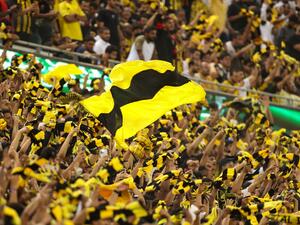 Ittihad supporters cheer during the Saudi Pro League football match between al-Ittihad and al-Hilal at the King Abdullah Sports City in Jeddah on May 23, 2022. (Photo by AFP)