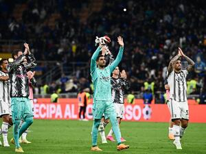 Juventus' players react at the end the Italian Cup semi-final second leg football match between Inter Milan and Juventus at the Giuseppe-Meazza (San Siro) stadium in Milan, on April 26, 2023. (Photo by Isabella BONOTTO / AFP)