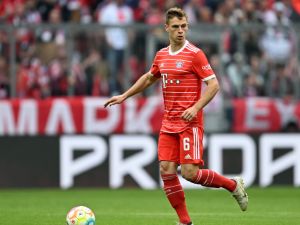 Bayern Munich's midfielder Joshua Kimmich plays the ball during the German first division Bundesliga football match between FC Bayern Munich and Schalke 04 in Munich, southern Germany, on May 13, 2023. (Photo by Christof STACHE / AFP) 