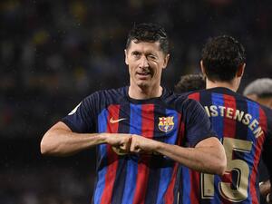 Barcelona's Polish forward Robert Lewandowski celebrates scoring his team's second goal during the Spanish league football match between FC Barcelona and Real Betis at the Camp Nou stadium in Barcelona on April 29, 2023. (Photo by Josep LAGO / AFP)