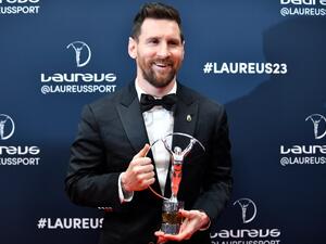 Argentinian football player Lionel Messi poses with his Laureus World Sportsman of the Year award during the 2023 Laureus World Sports Awards ceremony in Paris on May 8, 2023. (Photo by JULIEN DE ROSA / AFP)