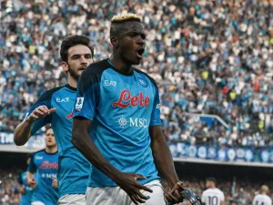 Napoli's Nigerian forward Victor Osimhen celebrates after scoring a penalty to open the scoring during the Italian Serie A football match between SSC Napoli and Fiorentina on May 7, 2023 at the Diego-Maradona stadium in Naples. Napoli makes their first appearance in front of their home fans on May 7 since becoming Italian champions for the first time since 1990 when they host Fiorentina. (Photo by Tiziana FABI / AFP)