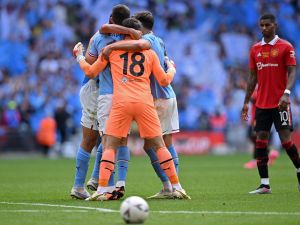 مانشستر سيتي يقتنص اللقب (Photo by Glyn KIRK / AFP)