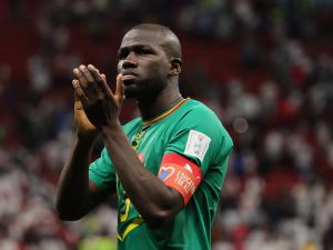 Senegal's defender #03 Kalidou Koulibaly applauds at the crowd after losing to England 3-0 in the Qatar 2022 World Cup round of 16 football match between England and Senegal at the Al-Bayt Stadium in Al Khor, north of Doha on December 4, 2022. (Photo by JACK GUEZ / AFP)
