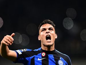 Inter Milan's Argentinian forward Lautaro Martinez celebrates after scoring his side's second goal during the UEFA Champions League quarter-finals second leg football match between Inter Milan and Benfica Lisbon on April 19, 2023 at the Giuseppe-Meazza (San Siro) stadium in Milan. (Photo by GABRIEL BOUYS / AFP)