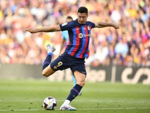 Barcelona's Polish forward Robert Lewandowski kicks the ball during the Spanish league football match between FC Barcelona and RCD Mallorca at the Camp Nou stadium in Barcelona on May 28, 2023. (Photo by Pau BARRENA / AFP)