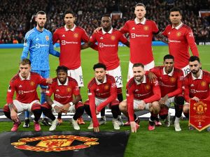 Manchester United players pose for team photo during the UEFA Europa league knockout round play-off second leg football match between Manchester United and FC Barcelona at Old Trafford stadium in Manchester, north west England, on February 23, 2023. (Photo by Oli SCARFF / AFP)