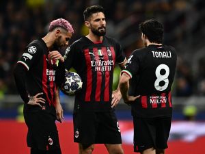 (From L) AC Milan's French defender Theo Hernandez, AC Milan's French forward Olivier Giroud and AC Milan's Italian midfielder Sandro Tonali react during the UEFA Champions League semi-final first leg football match between AC Milan and Inter Milan, on May 10, 2023 at the San Siro stadium in Milan. (Photo by GABRIEL BOUYS / AFP)