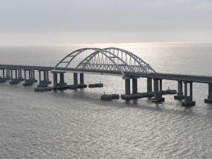 Crimean Bridge that spans the Kerch Strait, a narrow strip that links the Azov and Black seas. The Russian President. (Photo by Alexey NIKOLSKY / SPUTNIK / AFP) Crimean Bridge