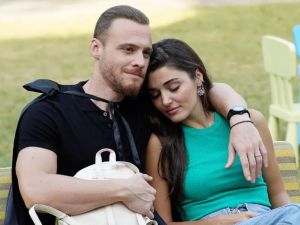 In picture: Hande Erçel is holding a mysterious man's hand in Paris.. Is it Kerem Bürsin?