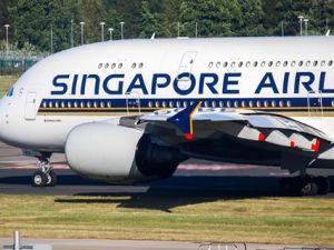 Record profits for Singapore Airlines group driven by strong passenger demand yet cargo segment faces challenges