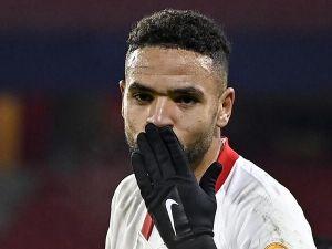 Sevilla's Moroccan forward Youssef En-Nesyri celebrates after scoring a goal during the UEFA Champions League Group E football match between Stade Rennais FC and Seville FC, at the Roahzon park stadium in Rennes, western France, on December 8, 2020. (Photo by DAMIEN MEYER / AFP)