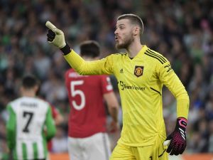 Manchester United's Spanish goalkeeper David de Gea gestures during the UEFA Europa League last 16 second leg football match between Real Betis and Manchester United at the Benito Villamarin stadium in Seville on March 16, 2023. (Photo by CRISTINA QUICLER / AFP)