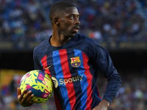 Barcelona's French forward Ousmane Dembele takes the ball during the Spanish league football match between FC Barcelona and CA Osasuna at the Camp Nou stadium in Barcelona on May 2, 2023. (Photo by LLUIS GENE / AFP)