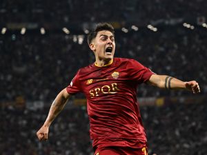 AS Roma's Argentinian forward Paulo Dybala celebrates scoring the opening goal during the UEFA Europa League final football match between Sevilla FC and AS Roma at the Puskas Arena in Budapest, Hungary on May 31, 2023. (Photo by Attila KISBENEDEK / AFP)
