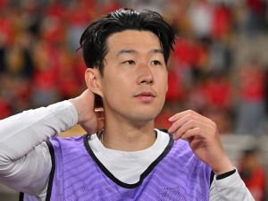 South Korea's Son Heung-min reacts on the bench before the friendly football match between South Korea and Peru at Busan Asiad Stadium in Busan on June 16, 2023. (Photo by Jung Yeon-je / AFP)