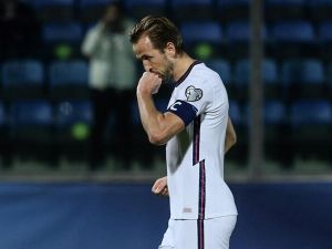 England's forward Harry Kane celebrates after scoring during the FIFA World Cup Qatar 2022 qualification Group I football match between San Marino and England on November 15, 2021 at Olympic stadium in Serravalle, San Marino. (Photo by Filippo MONTEFORTE / AFP)