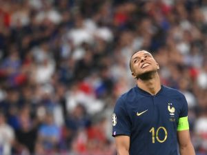 France's forward Kylian Mbappe reacts during the UEFA Euro 2024 group B qualification football match between France and Greece at the Stade de France in Saint-Denis, in the northern outskirts of Paris, on June 19, 2023. (Photo by FRANCK FIFE / AFP)