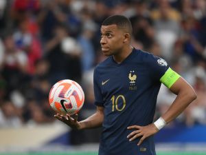 France's forward Kylian Mbappe looks on before taking a penalty shot during the UEFA Euro 2024 group B qualification football match between France and Greece at the Stade de France in Saint-Denis, in the northern outskirts of Paris, on June 19, 2023. (Photo by FRANCK FIFE / AFP)