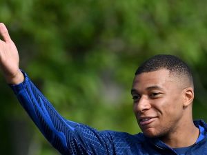 France's forward Kylian Mbappe gestures before a training session ahead of the upcoming UEFA Euro 2024 football tournament qualifying matches in Clairefontaine-en-Yvelines, on June 12, 2023. France will play against Gibraltar on June 16, 2023 and against Greece on June 19, 2023 in their UEFA Euro 2024 Group B Qualification matches. (Photo by FRANCK FIFE / AFP)