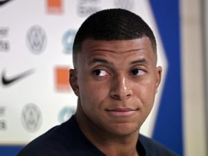 France's forward Kylian Mbappe looks on during a press conference at the Algarve stadium, in Faro on June 15, 2023, on the eve of their UEFA Euro 2024 group B qualification football match against Gibraltar. (Photo by Thomas COEX / AFP)