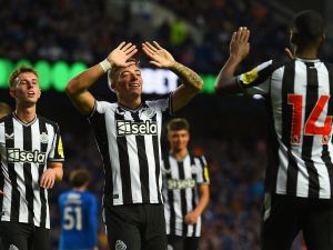 Newcastle United's Scottish defender Harrison Ashby (C) celebrates after scoring their second goal during the pre-season friendly football match between Rangers and Newcastle United at the Ibrox Stadium, in Glasgow, on July 18, 2023. (Photo by ANDY BUCHANAN / AFP)