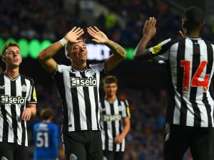 Newcastle United's Scottish defender Harrison Ashby (C) celebrates after scoring their second goal during the pre-season friendly football match between Rangers and Newcastle United at the Ibrox Stadium, in Glasgow, on July 18, 2023. (Photo by ANDY BUCHANAN / AFP)