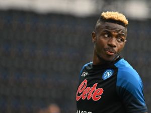 Napoli's Nigerian forward Victor Osimhen warms up prior to the Italian Serie A football match between Napoli and Sampdoria on June 4, 2023 at the Diego-Maradona stadium in Naples. (Photo by Tiziana FABI / AFP)