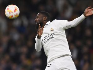 Real Madrid's German defender Antonio Rudiger heads the ball during the Copa del Rey (King's Cup) semi final first leg football match between Real Madrid CF and FC Barcelona at the Santiago Bernabeu stadium in Madrid on March 2, 2023. (Photo by OSCAR DEL POZO / AFP)